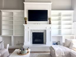 If you haven't already considered adding lovely fireplace wall cabinets to your home or stunning built in bookcases around fireplace mantels. Diy Built In Cabinets Around The Fireplace Part 2 Honeybear Lane