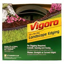 There's literally no digging required, and you simply use the included stakes to secure the edging right on top of the weed barrier in whatever shape or design you want. Vigoro 20 Ft No Dig Landscape Edging Kit 3001 20hd The Home Depot