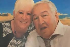 Family's 'horror' as flowers taken from grave of two young sisters