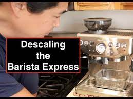 There is an issue with the coffee grinds chute disc. How To Descaling Breville Barista Express Youtube
