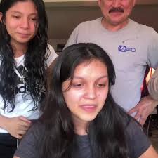 Little girl befriends kind stranger at airport