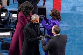 People hold posters of kamala harris to celebrate after she was sworn in as u.s. Fist Bumps Cute Kids And A Giant Bird Not To Miss Moments From The Inauguration The Boston Globe
