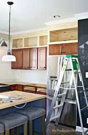 What A Genius Way To Add Height To Short Cabinets Kitchen Cabinets To Ceiling Upper Kitchen Cabinets Above Kitchen Cabinets