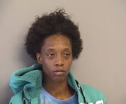 Tulsa police arrest an ex-con accused of robbing employees at a convenience  store, then spitting