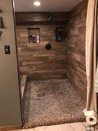 Kitchen and bathroom tiles are an excellent decorating material that is always in style. 6x5 Walk In Wood Look Tiled Shower Style Selections Natural Timber Cinnamon Porcelain Floor And Wall Tile Co Wood Tile Shower Shower Tile Wood Tile Bathroom