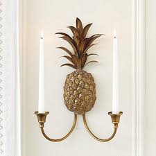 The metal candle holder base is 4 inches wide and is recommended for use with a 3 or 3.5 inch base pillar candle. Gold Pineapple Candle Sconce