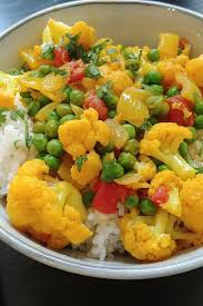 Vegetarian Indian Cauliflower And Pea Curry Recipe In 2020 Vegetarian Indian Indian Cauliflower Curry Recipes
