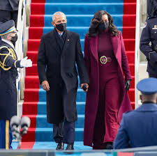 Meaning Behind Michelle Obama S Outfit At The 2021 Inauguration Michelle obama greeted them wearing a red dress with a black belt and shoes.
