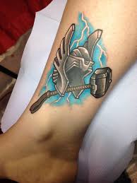 For centuries, men have been tattooing themselves with mjolnir, the hammer of thor, just as many did in the time of the. Thor Helmet With Hammer Tattoo On Leg By Mike Bianco