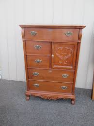 This bedstead showcases a solid wood frame with dovetail corner construction, promising enduring quality and many years of use, framed by four low posters with carved finials. 00001 Lexington Victorian Sampler Oak High Chest Dresser 391 307 Antique Price Guide Details Page
