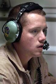 US Air Force (USAF) First Lieutenant (1LT) Fred Hixson, Electronic Combat  Officer, mans his station onboard a USAF E-3"Sentry"Advanced Warning And  Control System (AWACS) aircraft, in support of Operation SOUTHERN WATCH
