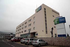 There was a couple sitting in cheap lawn chairs i suppose sitting outside their room surrounded by beer cans. The Hotel From Outside Picture Of Holiday Inn Express Vitoria Vitoria Gasteiz Tripadvisor