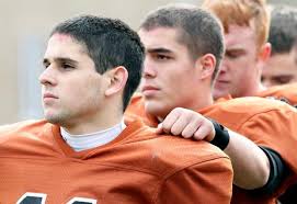 Pitman promotes alum Chris Thomas to coach, improve struggling football  program