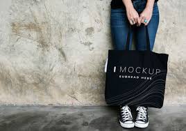 Download Woman Carrying A Black Tote Bag Mockup Psd Template All Free Mockups Mockupworld Yellowimages Mockups