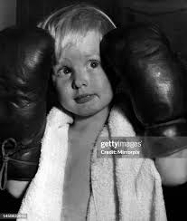 31 Boxing Gloves Around Neck Stock Photos, High-Res Pictures, and Images