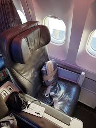 Air transat cabin crew wears a uniform in black. Review Of Air Transat Flight From Toronto To Montego Bay In Business