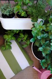 Some herb garden ideas can be as simple as throwing a few seeds in a trio of tin pails and setting them on your kitchen window sill. Ikea Hack Balcony Herb Garden Hello Lady