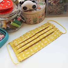 Free face mask sewing pattern + step by step photo tutorial how to make a mask out of cloth (with pocket for filter insert). Simple Surgical Style 3 Pleats Face Mask Pattern