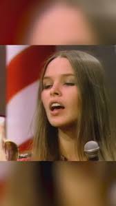 A defiant Michelle Phillips eating a banana