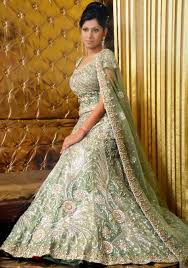 Indian Bride Olive Green Banarasi Pure Georgette And Net Wedding Fish Tail Lehnga Indianwedding Sou Green Wedding Dresses Bridal Dress Design Bridal Dresses