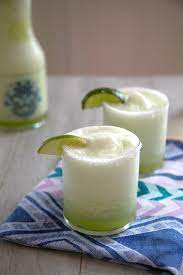 Honeydew Ginger Frozen Margarita This Unique Frozen Cocktail Is Perfect For Any Time Of Year But I Ll B Frozen Margaritas Margarita Margarita Recipe Frozen