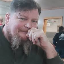 What are some good hair salons or barbers in Tawas?