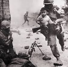 This Image Shows An American Soldier Risking His Life To Save Two Vietnamese Children During A Fight This Is Bravery Vietnam War Vietnam American Soldiers