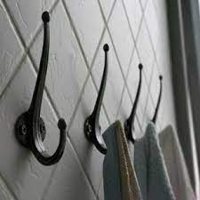 Diy color dipped clothes hangers | sugar & cloth with it being winter here in houston for the last month and a half, i've finally decided to create a cute designated space for our coats and bags that isn't the middle of the meeting table and every chair back in the room. China Wall Wrought Iron Hanger Lf0037 China Bathroom Towel Hook And Bathroom Wrought Iron Towel Hanger Price