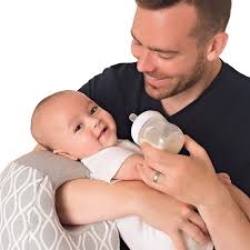 The dawn nursing pillow is a calming, dark blue, floral print that provides a stylish and whimsical atmosphere for both mom and baby. Amazon Com Itzy Ritzy Infant Nursing Pillow Milk Boss Breastfeeding And Bottle Feeding Pillow And Positioner Rotates Around Arm To Offer Varying Levels Of Cushion And Relieve Arm Strain Platinum