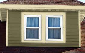 White house with prominent black window top trim White Replacement Windows And House Colors To Avoid Oldhouseguy Blog