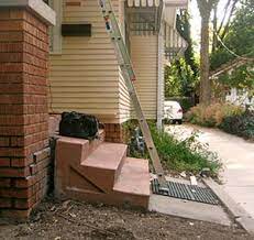 Next, i begin to fill the cavity, making sure to force the concrete all around the post. Henry Nelson Carpentry Case Studies