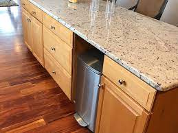 And once it's done, next is sanding the wood. To Paint The Yellowing Maple Cabinets Or Not How To Update This 90s