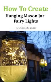 Diy mason jar lights with flowers. How To Create Hanging Mason Jar Fairy Lights Michelle James Designs