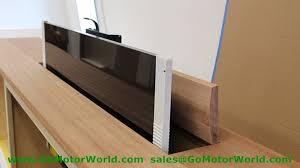 You can purchase a motorized tv lift mechanisms that starts at $650 and install it inside an existing cabinet or on a wall behind a cabinet. Tv Lift Tv Stand Tv Mount 110 240v Ac Input 1000mm 40inch Stroke With Remote And Controller And Mounting Bracket Parts Stand Bracket Remote Controlled Tv Mounttv Bracket Mount Aliexpress