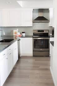 Small Kitchen Remodel By Eggshell Home White Shaker Cabinets Gray Quartz Coun White Cabinets White Countertops Kitchen Cabinet Design Condo Kitchen Remodel