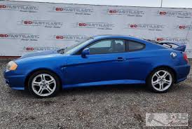 Image result for Sunny Yellow 2004 Tiburon