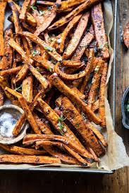 Herb Butter Baked Sweet Potato Fries Half Baked Harvest Recipe Sweet Potato Fries Baked Sweet Potato Recipes Sweet Potato Fries