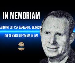 Safety First: Officer George Rust Inspects Cars in May 1965