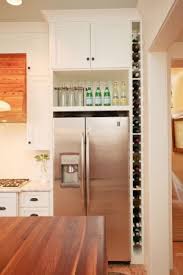25 Ways To Update Your Kitchen From Pinterest Built In Wine Rack Kitchen Cabinetry Kitchen Remodel