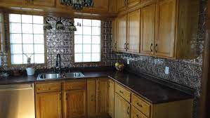 Get free shipping on qualified american tin ceilings tile backsplashes or buy online pick up in store today in the flooring department. A Diy Project Under 100 The Tin Backsplash American Tin Ceilings