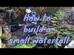 Great Demo Of Rock Work Spill Rock And Putting Moss On To Immediately Age The Waterfall And Have It Loo Garden Waterfall Small Waterfall Waterfall Landscaping