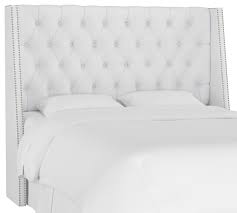 The button tufted wingback headboard provides style in the details. In Stock Williams Nail Button Wingback Headboard Velvet White Transitional Headboards By Skyline Furniture Mfg Inc Houzz