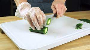 Use the spoon to scrape the seeds and membrane out of the halves. How To Slice A Jalapeno Youtube