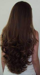 The puffy top is high, fastened at the back with hidden pins. Hair Cuts For Long Hair Straight