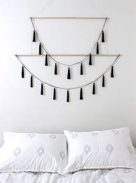 These bedroom wall decor pieces help create some real personality in the space, customized to the client. How To Decorate With Tassels Wall Decor Bedroom Easy Home Decor Yarn Wall Hanging