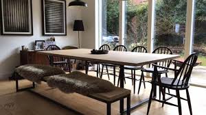 Louis wooden table with curved legs available in many rectangular or squared models in the fixed and extendable versions. Oak Dining Table