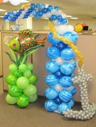 Use some curly pool noodles, foam flowers and plastic table cloths to make this cute coral reef. 81 Pool Balloon Decor Ideas Balloons Balloon Decorations Pool Party