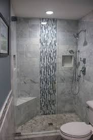 Lighten up a small space with white trim, white patterned wallpaper, white shower tile and a sweet, traditional vanity. Bathroom Tile Ideas Mosaic Shower Tile Ideas Small Bathroom Floor Tiles Design Ideas K Bathroom Remodel Shower Master Bathroom Shower Small Bathroom Remodel
