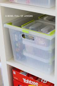 What's the solution to tying up table tops or floor space with a puzzle in progress? How To Organize The Playroom A Bowl Full Of Lemons