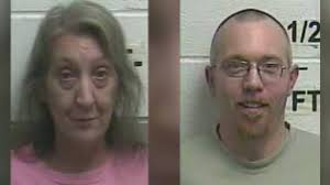 Three people arrested after two children found lost in the woods